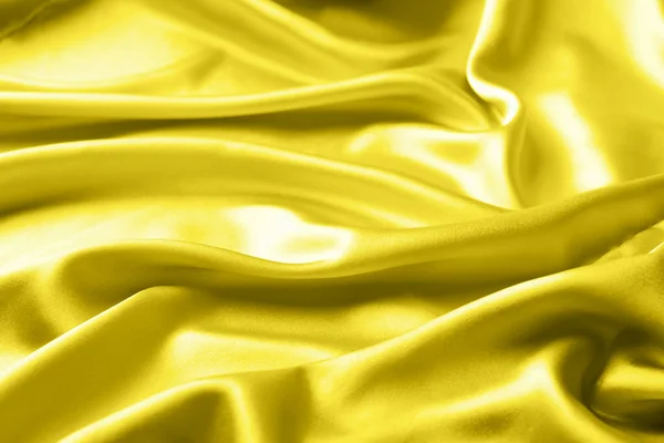 Tela de seda revestida en amarillo de iluminación de moda en 2021. Fondo moderno abstracto —  Fotos de Stock