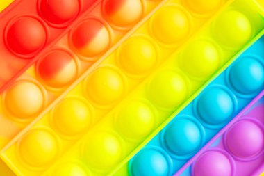 Moda, parlak oyuncaklar anti-stres patlaması komik renkli yumuşak kabarcıklar yakın plan. Yumuşak Baloncuk Silikonlu Stres Rahatlaması Oyuncağı