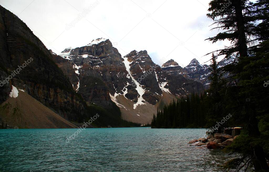 Typical Canada: Beautiful and famous Moraine Lake in Banff Nationalpark, Alberta, Canada. Travel and Holiday Concept.
