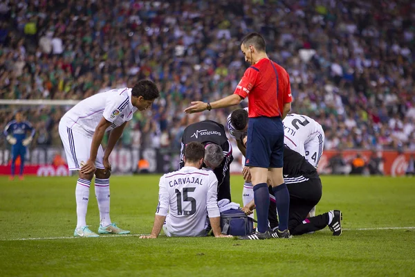 Médicos con jugador lesionado —  Fotos de Stock