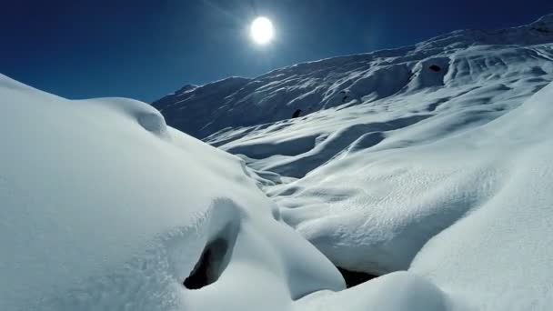 Flying over snowcapped landscape. — Stock Video