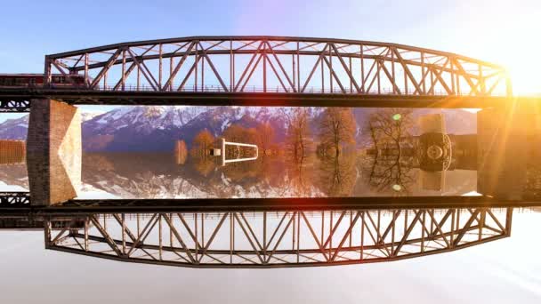 Tren cruzando un puente al atardecer — Vídeo de stock