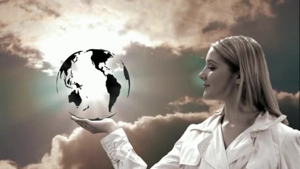 Happy woman holding earth globe on the hand — Stock Video