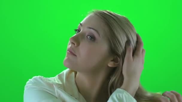 Woman playing with her hair — Stock Video