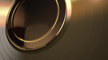 Yakın plan altın plak kanalı döner çember ve yansıtıcı etiket, sıcak metalik parlaklık