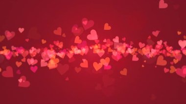 kalp kurdelesi ile kırmızı arka plan ortadaki parlak parlak bokeh ideal hareket