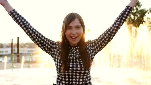 Young stylish woman dancing outdoors — Stock Video