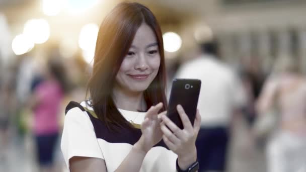 Woman using smartphone — Stock Video