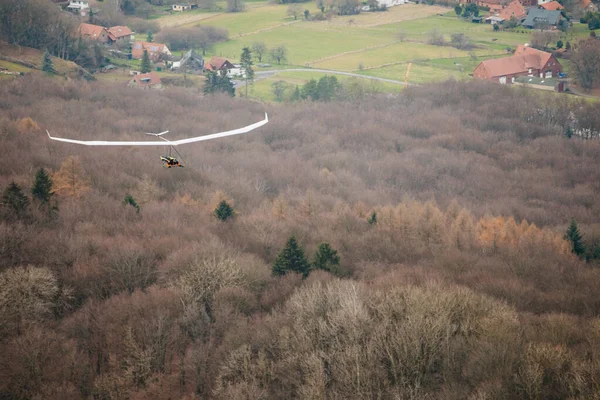 Hang glider in the air on a sunny day. High quality photo