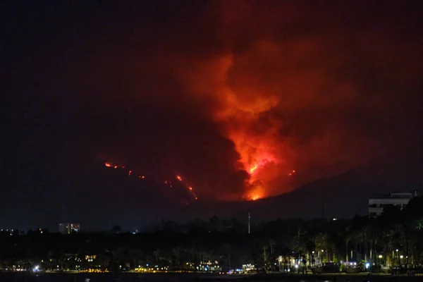 Big cloud of fire with the face of as devil in Estepona Sierra Bermeja fire