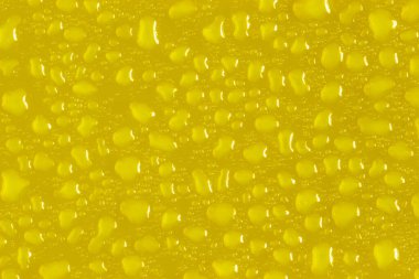 Düz bir yüzeydeki birçok su damlasının arkaplanı