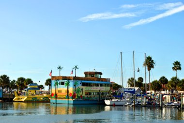 Tourist cruise boats in Clearwater Beach harbour Florida clipart