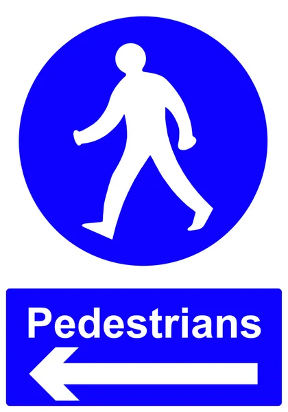 Fußgänger halten sich an das Linksschild — Stockfoto