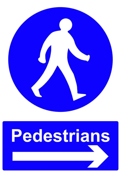 Fußgänger halten sich an das richtige Schild — Stockfoto