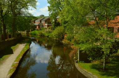 Houses by the Huddersfield Narrow Canal in Friezland Saddleworth Moor, Oldham clipart