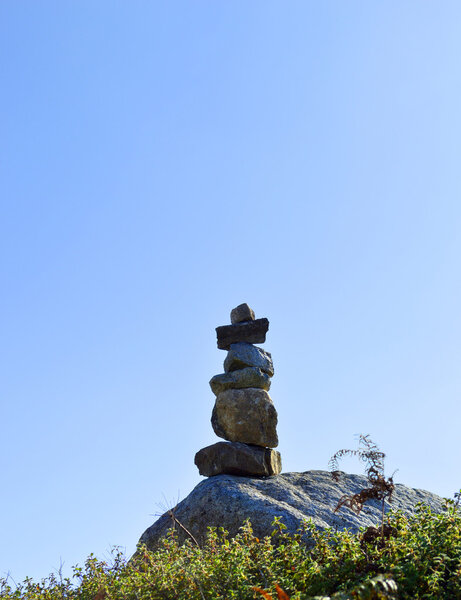 Stones balancing on top of Foia the highest mountain of Algarve, Portugal.