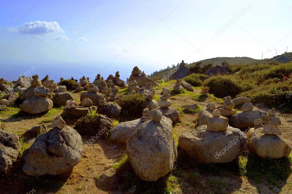 Stones balancing on top of Foia the highest mountain of Algarve, Portugal