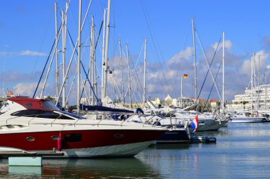 Luxury yachts in Vilamoura Marina clipart