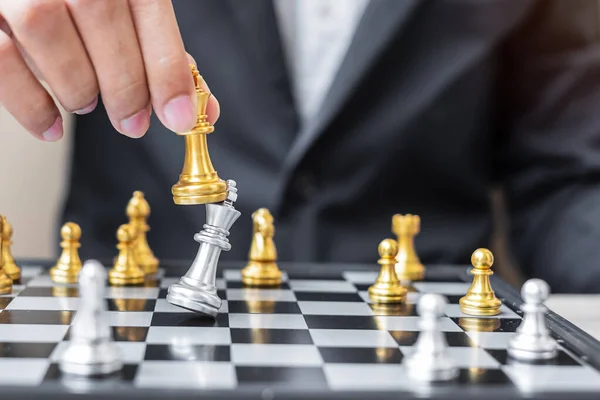 Businessman Hand Moving Gold Chess King Figure Checkmate Enermy Opponent — Stock Photo, Image