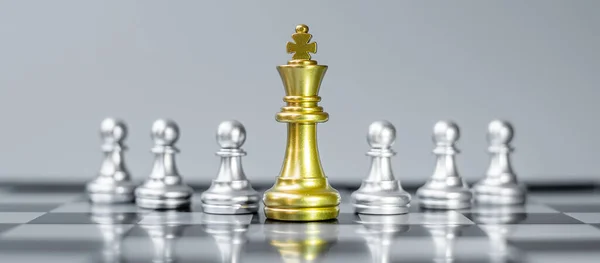gold Chess king figure Stand out from the crowd on Chessboard background. Strategy, leadership, business, teamwork, different, Unique and Human resource management concept