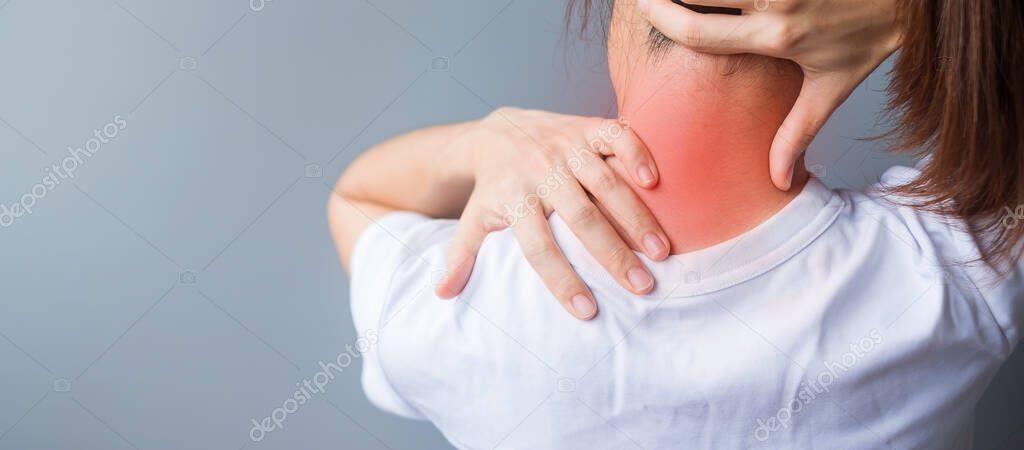 woman with her neck sprain, muscle painful during overwork. Girl having body problem after wake up. Stiff neck, office syndrome and ergonomic concept