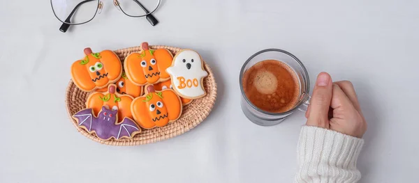 Woman Hand Holding Coffee Cup Eating Funny Halloween Cookies Happy — Stock Photo, Image