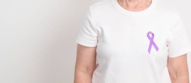 Tüm Kanser İçin Açık Mor Kurdele, Nisan Özfajlı Kanser, Ocak Tiroid Hastalığı, Eylül Hodgkin Lenfoması, Bilinç Ayı ve Şubat Dünya Kanser Günü kavramları