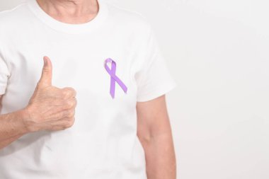 Tüm Kanser İçin Açık Mor Kurdele, Nisan Özfajlı Kanser, Ocak Tiroid Hastalığı, Eylül Hodgkin Lenfoması, Bilinç Ayı ve Şubat Dünya Kanser Günü kavramları