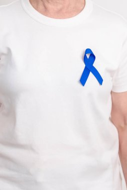 Koyu mavi ya da lacivert kurdeleli yaşlılar March Colectal ve Colon Cancer Awareness ayı, May Arthritis farkındalığı, July Juvenile artrit ve Childhood konsepti için. Sağlık ve Dünya Kanser Günü