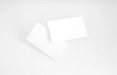 Yüzen İş Kartı Model 'i. Arka planda havada yüzen iki boş kartvizit var.