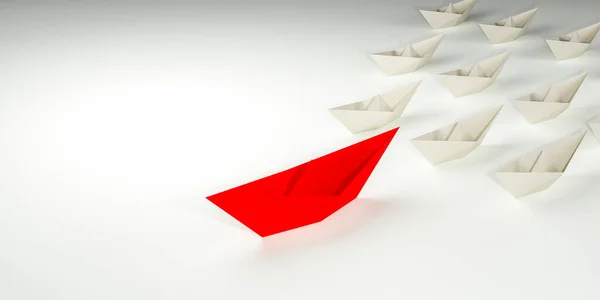 Innovative business solution concept. Group of white paper ships in one direction and leading one red paper ship