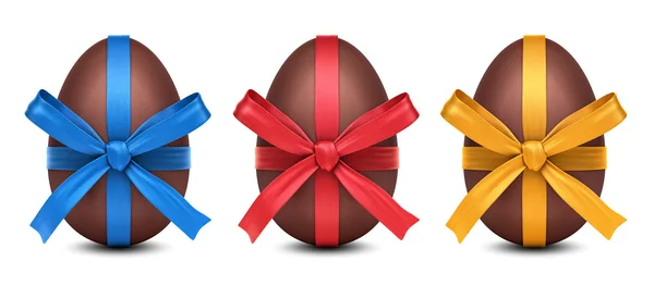 Coleção de ovos de Páscoa de chocolate 3D com laços de fita coloridos — Fotografia de Stock