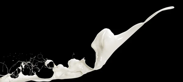 Flygande stänk mjölk isolerad på svart bakgrund — Stockfoto