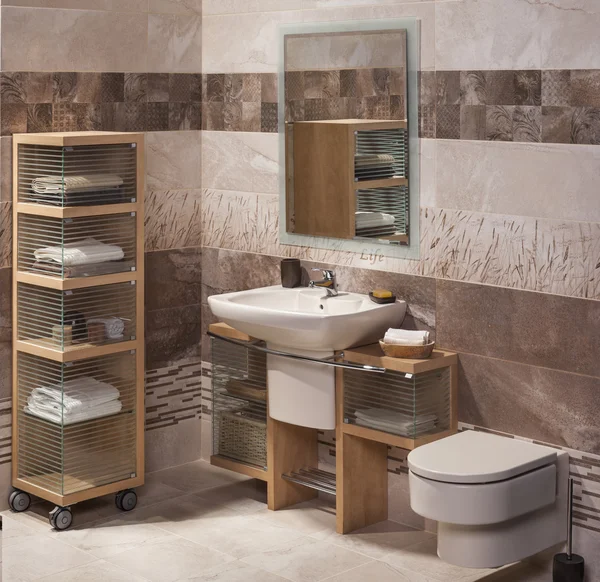 Detail of a modern bathroom with sink, cabinet for towels and to — Stock Photo, Image