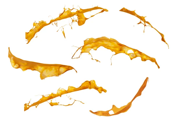 Spritzer oranger Farbe isoliert auf weißem Hintergrund — Stockfoto