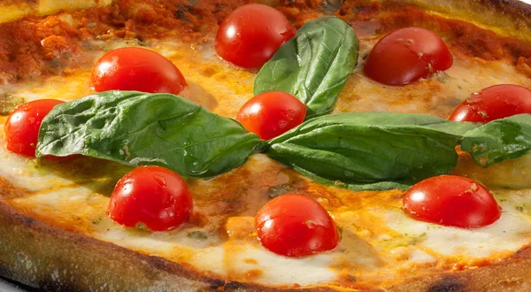 Pizza with cherry tomatoes and herbs — Stock Photo, Image