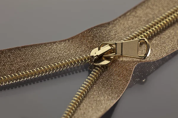 Golden brown zipper — Stock Photo, Image