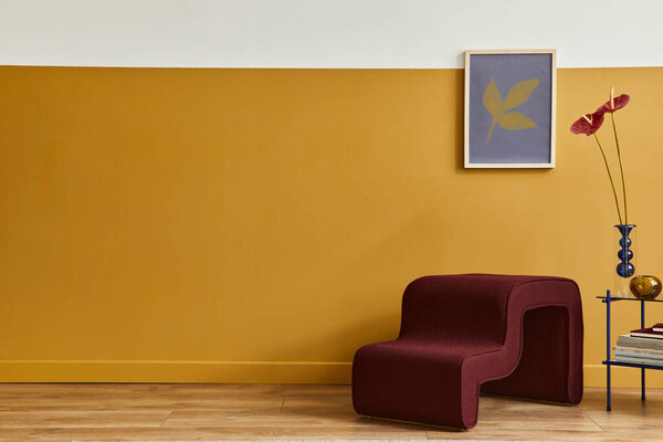 Unique living room in modern style interior with design stool,  elegant coffee table, mock up poster frame, flowers in vase, decoration and pesronal accessories in home decor.  Copy space. Template.