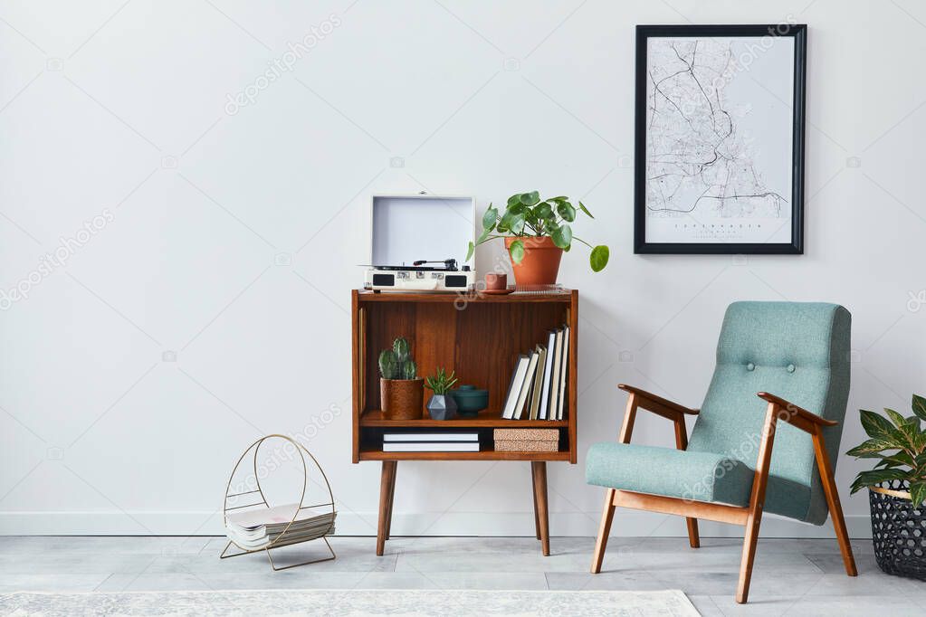 Retro composition of living room interior with mock up poster map, wooden shelf, book, stool, armchair, plant, cacti, vinyl recorder and personal accessories in stylish home decor.