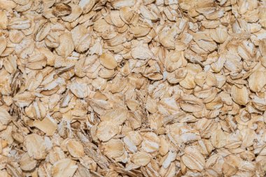 Çiğ yulaf gevreğini kapat. Arkaplan