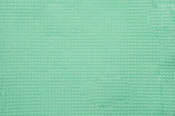 Detailní záběr vzorovaného pastelově zeleného ubrousku — Stock fotografie