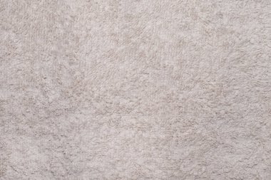 Açık bej tüylü halıyı kapat