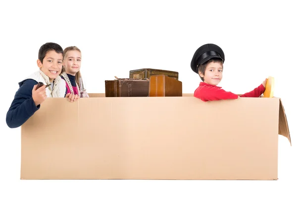 Kids playing VIP passengers — Stock Photo, Image