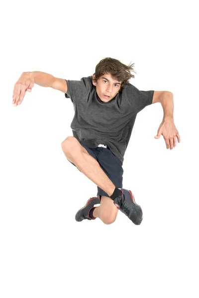 Jumping teenage boy — Stock Photo, Image