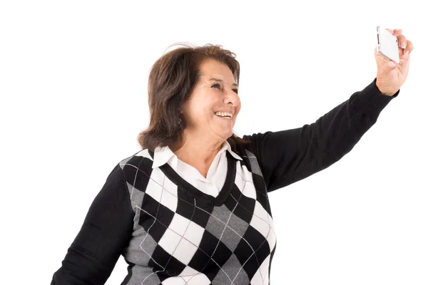 Mujer mayor tomando selfie — Foto de Stock