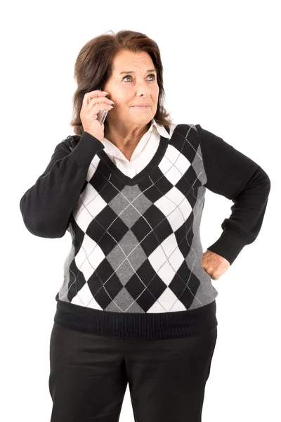Пожилая женщина с телефоном — стоковое фото