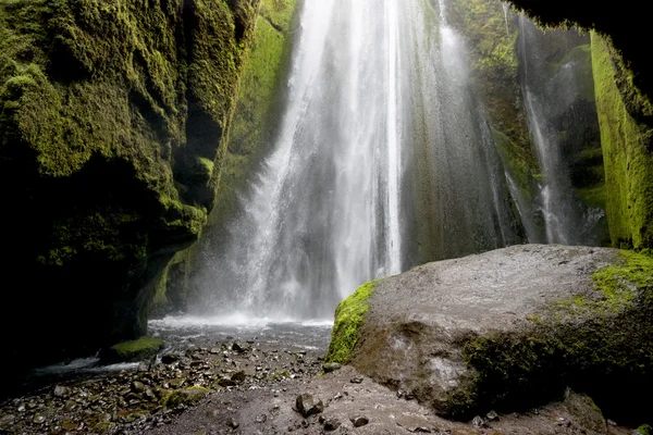 Waterfall and cave in Iceland — Stock Photo, Image