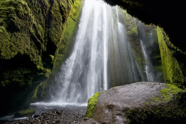 Waterfall and cave in Iceland — Stock Photo, Image