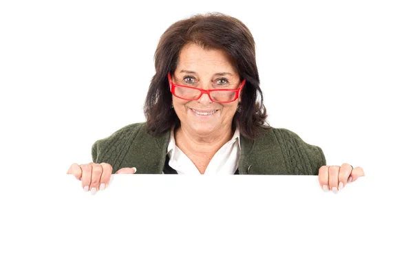 Senior vrouw met leeg bord — Stockfoto