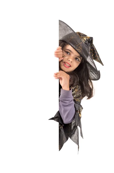 Girl wearing Halloween witch costume — Stock Photo, Image